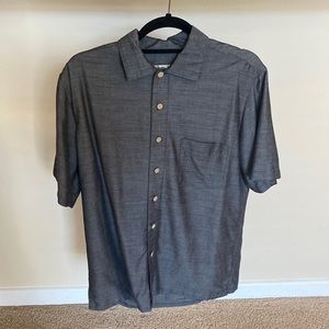 Medium colored shirt. Like new. Has slight sheen to it. Great condition like new